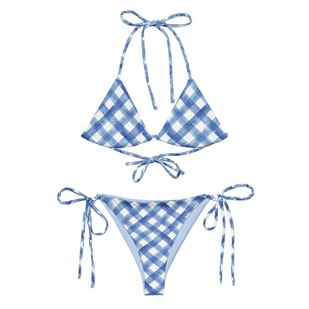 A blue gingham string bikini set with adjustable ties on the sides and a halter neck top.