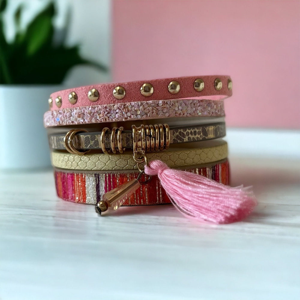 Multilayer bracelet for women - pink tassel